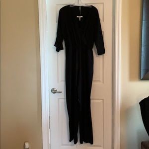 BCBGeneration black jumpsuit, open back, 3/4 slv M
